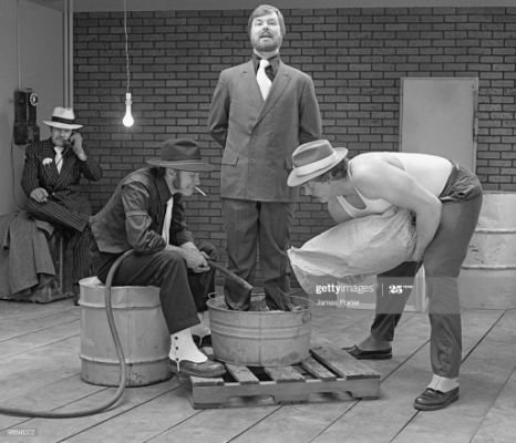 gangsters-pouring-cement-shoes-picture-id98846372_cf.jpg.1c3e522863228e78cb541d4fe09bd5fb.jpg